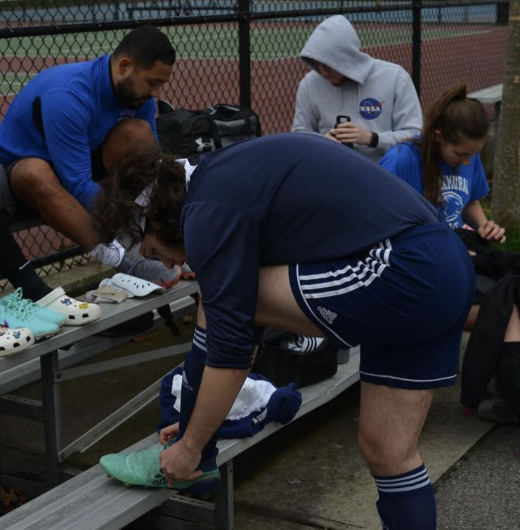 Me tying my cleats