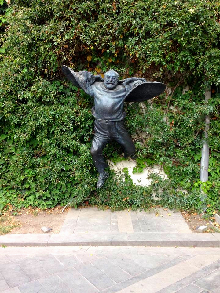 Man in a Bush Statue