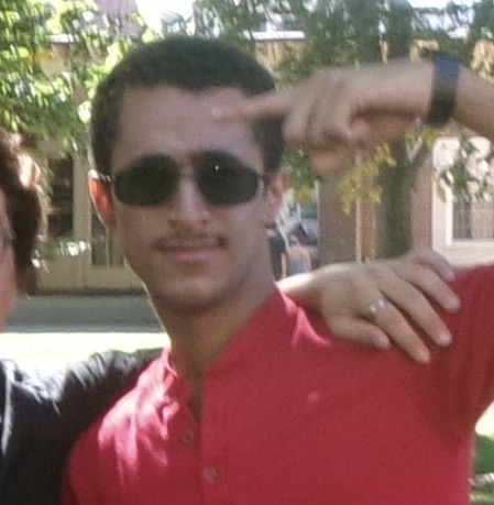 Picture of a cool Dominican man with glasses.