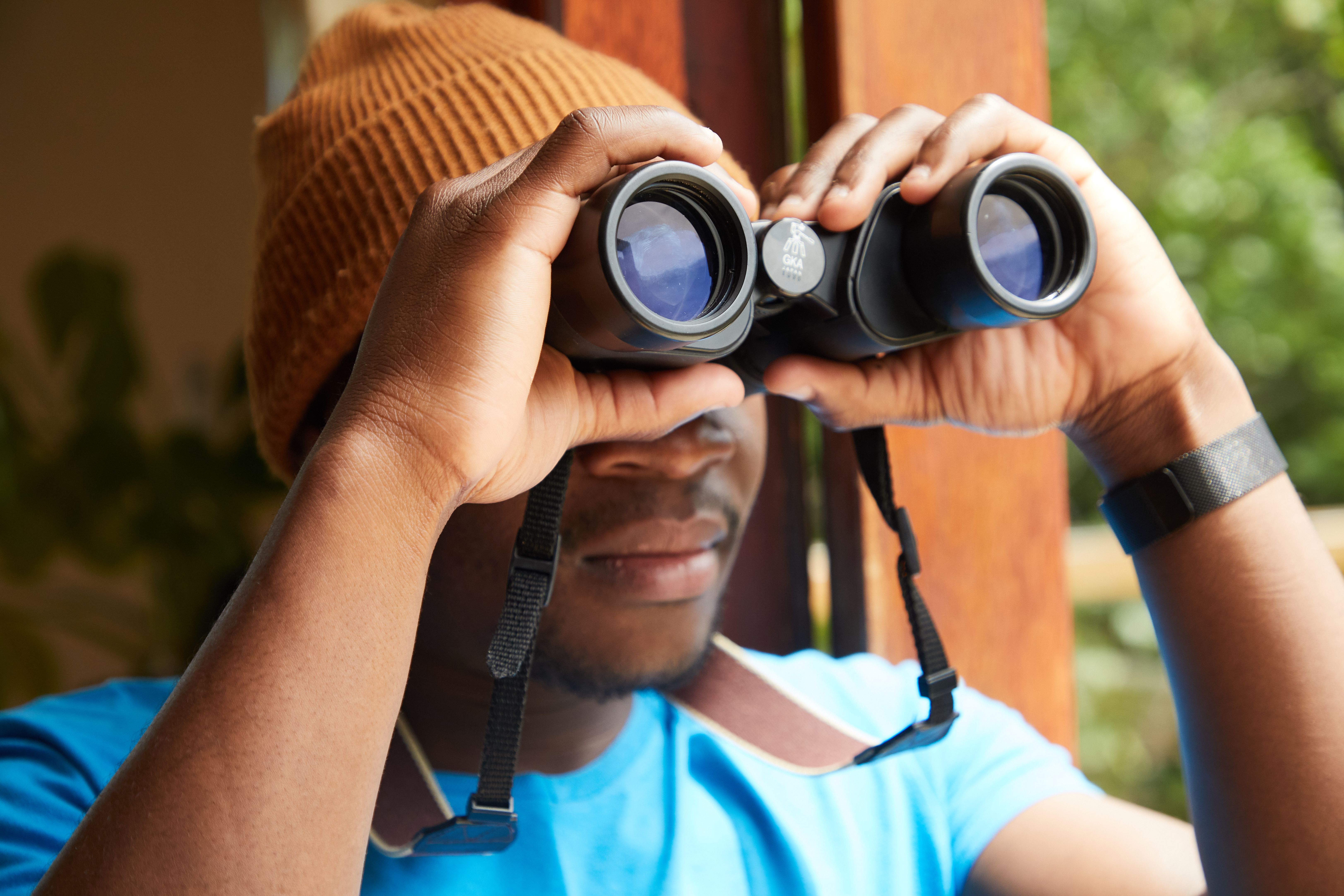Man Using Binoculars